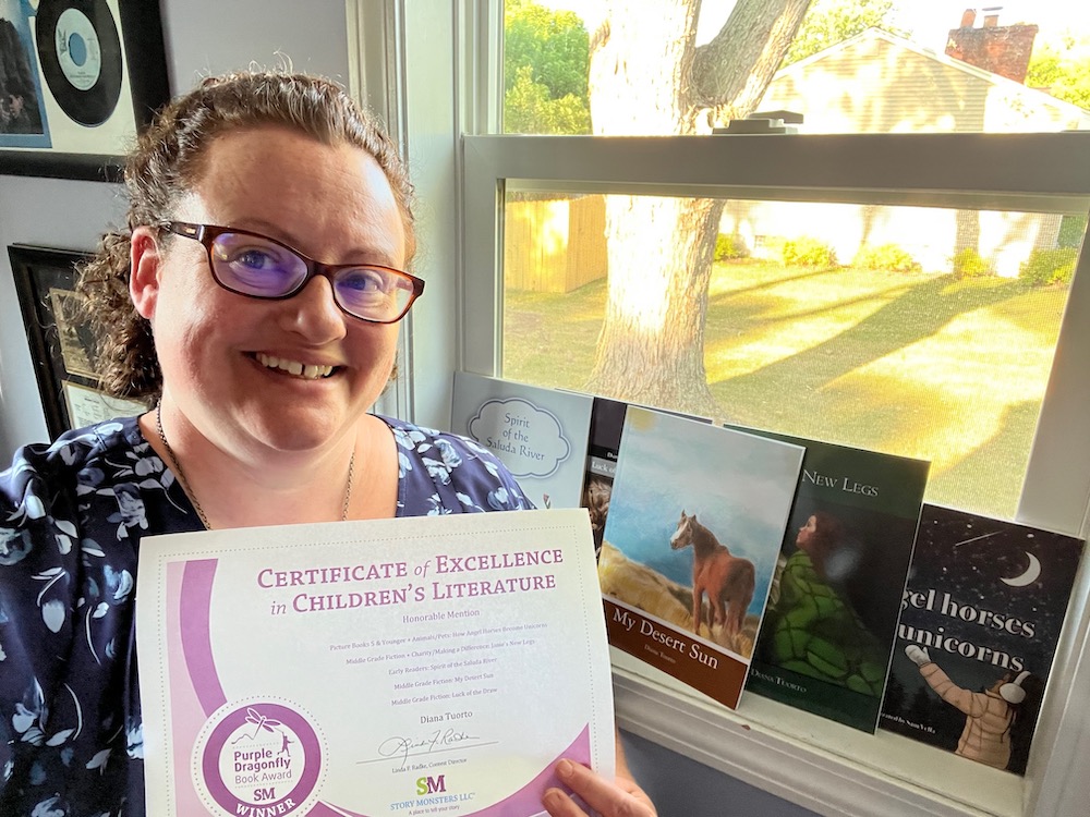 Diana with certificate.